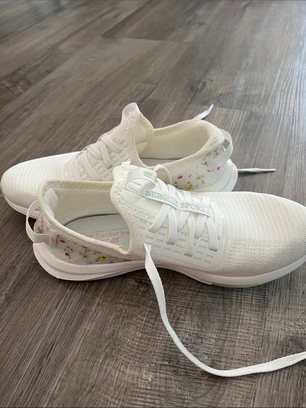 brand new new balance sneakers with floral details